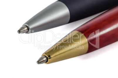 Pens close-up, isolated on white background