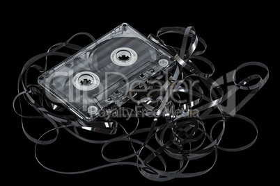 Close up of vintage audio tape cassette, isolated on black, with