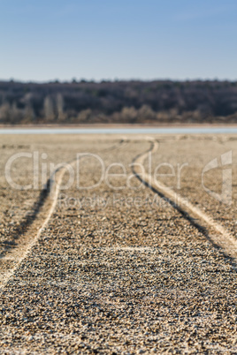 The road along the bottom of the dried lake, shallower depth of