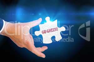 Go green! against blue background with vignette