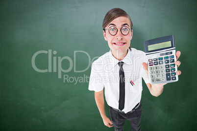 Composite image of geeky smiling businessman showing calculator Composite image of geeky smiling businessman showing calculator