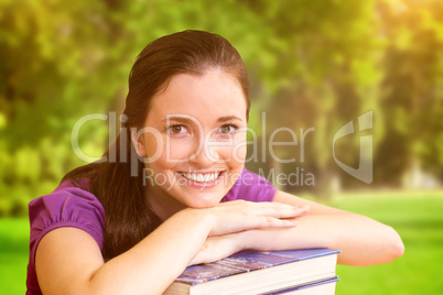 Composite image of portrait of female student in library