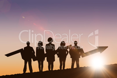 Composite image of business team with arrow