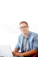 Composite image of hipster on laptop