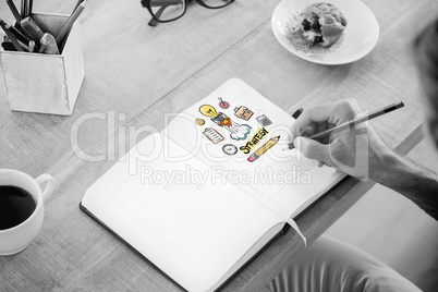 Composite image of man writing notes on diary