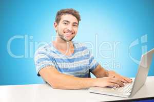 Composite image of student on laptop