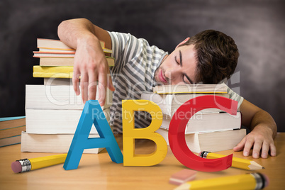 Composite image of student asleep in the library