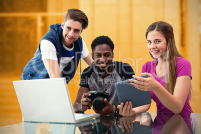 Composite image of creative young business team looking at digit