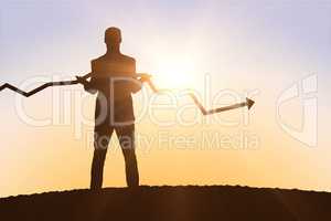 Composite image of businessman with arrow