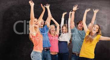 Composite image of a jumping happy group cheering