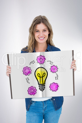 Composite image of pretty girl showing a book