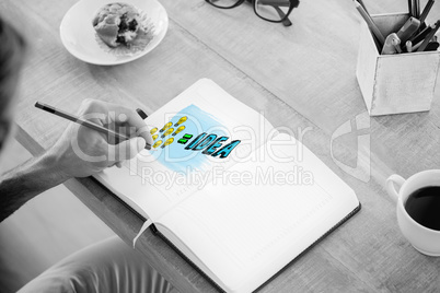 Composite image of man writing notes on diary