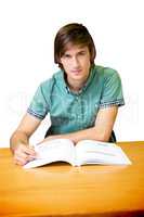 Composite image of student sitting in library reading