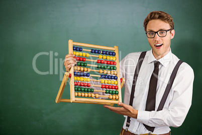 Composite image of geeky businessman using an abacus