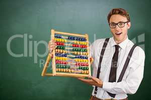 Composite image of geeky businessman using an abacus