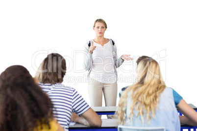 Composite image of teacher teaching students in class