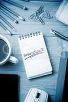 Generation z against notepad on desk