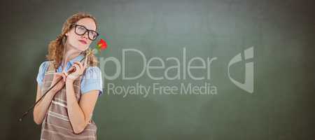 Composite image of geeky hipster woman holding rose