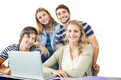 Students using laptop in classroom