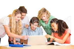 College students using laptop in library