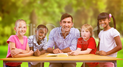 Composite image of teacher and pupils smiling at camera at libra