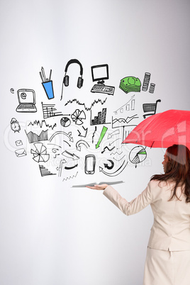 Composite image of businesswoman showing a book