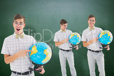 Composite image of nerd with globe