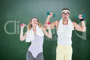 Composite image of geeky hipster couple lifting dumbbells in spo