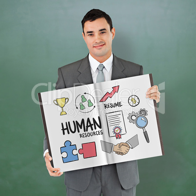 Composite image of businessman showing a book