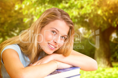 Composite image of portrait of female student in library