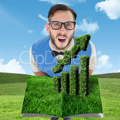 Composite image of man holding lawn book