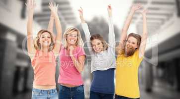 Composite image of smiling celebrating girls jumping up