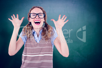 Composite image of geeky hipster woman smiling and showing her h