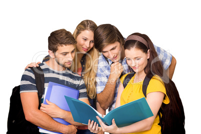 Composite image of students holding folders at college corridor