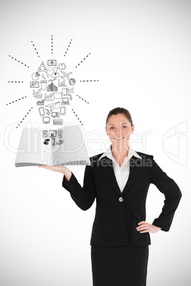 Composite image of businesswoman showing a book