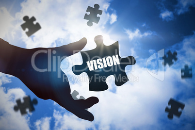 Vision  against bright blue sky with clouds