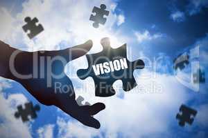Vision  against bright blue sky with clouds
