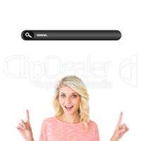 Composite image of pretty blonde smiling and pointing up