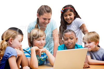 Composite image of cute pupils using tablet computer in library