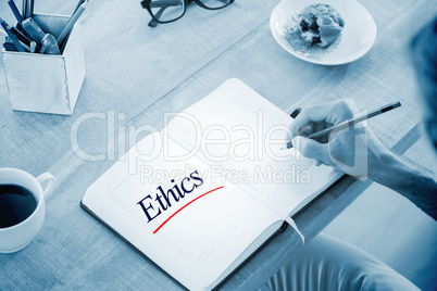 Ethics against man writing notes on diary