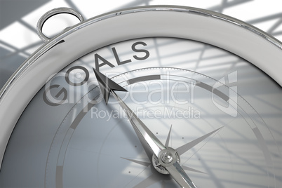 Composite image of compass pointing to goals