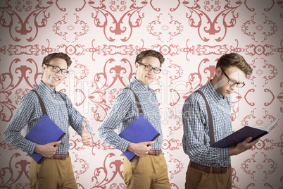 Composite image of nerd with notebook