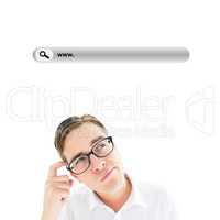 Composite image of geeky businessman scratching his head