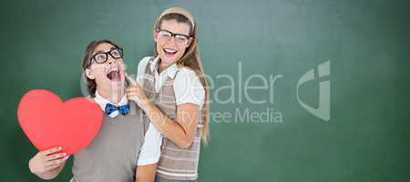 Composite image of excited geeky hipster and his girlfriend
