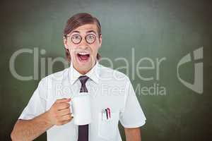 Composite image of geeky businessman holding a mug