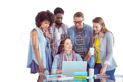 Composite image of fashion students working as a team