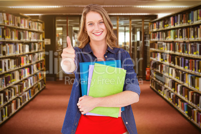 Composite image of smiling student holding notebook and file