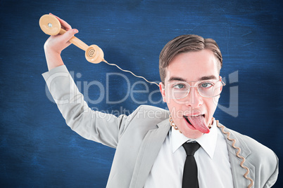 Composite image of geeky businessman being strangled by phone co