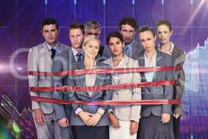 Composite image of upset business team fastened with adhesive ta