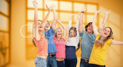Composite image of a jumping happy group cheering